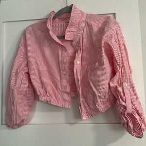 Cropped pink and white button down shirt with scrunched bottom.